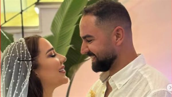 أسما شريف منير وزوجها