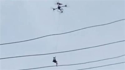 بطائرة دون طيار.. تفاصيل إنقاذ شخص لجاره بعد محاصرة الفيضانات له في جنوب الصين
