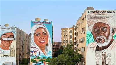 علي عبد الفتاح ومها جميل.. ثنائي جداريات الشارع يبدع في تزيين وجه أسوان