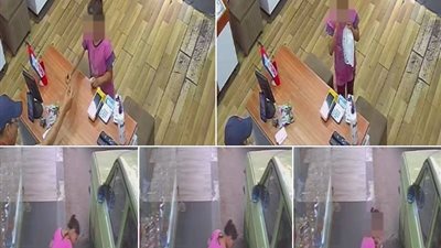 بائعة مناديل صغيرة بالشارع تتقاسم قطعة دجاج أعطاها لها شخص مع قطة 