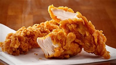 بمكعبات الثلج.. طريقة عمل الدجاج المقلي المقرمش في البيت مثل أشهر المحلات