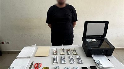 القبض على المتهم بتقليد وترويج العملات الأجنبية بالدقي