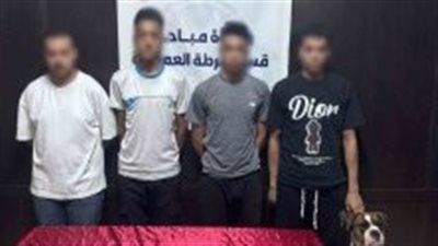 بحوزتهم كلب.. القبض على المتهمين بتعاطي المخدرات وسط الشارع بالعمرانية