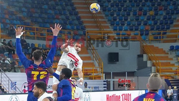 يد الزمالك وبرشلونة