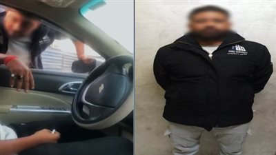 ضبط سايس لمساومته سائق سيارة على دفع أموال نظير توقف سيارته بالجيزة
