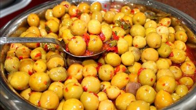 طريقة عمل الزيتون المخلل بالعُصفر والليمون المسلوق.. التفاحي غير العزازي