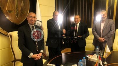 مذكرة تفاهم بين نادي القضاة ومعهد البحوث والدراسات العربية (صور)
