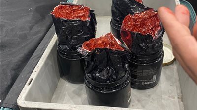 ضبط 11 كيلو ونصف كيلو حشيش مصنع بمطار القاهرة 