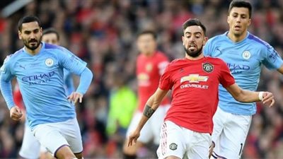 جوندوجان وفيرنانديز ينفردان برقم قياسي في الدوري الإنجليزي