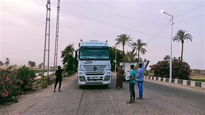 أهالي الجبلاو بقنا يوزعون وجبات إفطار على روح شهيدي القرية بحادث أتوبيس أسيوط