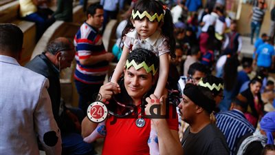 مشاهد من احتفال الأقباط بـ”أحد السعف” في دير سمعان الخراز بالمقطم