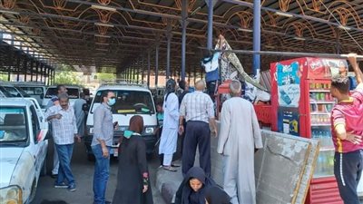 رفع الإشغالات والتعديات بموقف أقاليم أسوان