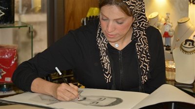 فنانة بورسعيدية تبدع في رسم الشهيد عبد الله الحمامي