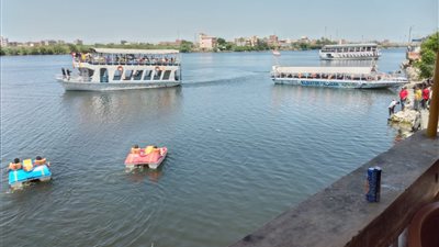 توافد أهالي كفر الشيخ على الحدائق والمنتزهات في أول أيام عيد الأضحى (صور)