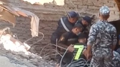 إنقاذ سيدة من تحت أنقاض عقار إمبابة المنهار بعد وفاة زوجها 