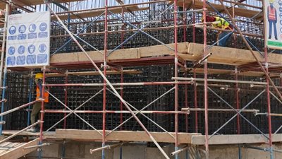 الإسكان: رفع كفاءة الطرق بالحي الثالث بالعاشر من رمضان