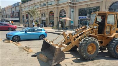 جهاز القاهرة الجديدة يشن حملة لإزالة مخالفات مول كونكورد بلازا على الشوارع