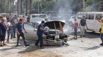 السيطرة على حريق سيارة ملاكي بشارع الهرم | صور