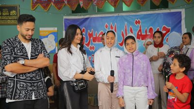 حمادة هلال يحتفل مع بسنت سمعان بالأيتام: نسعى لرسم البسمة على وجوههم | صور