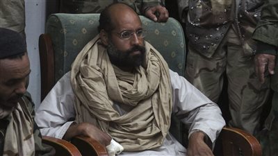 هل يستطيع سيف الإسلام القذافي الظهور لتقديم أوراق ترشحه للانتخابات الليبية؟ | تقرير