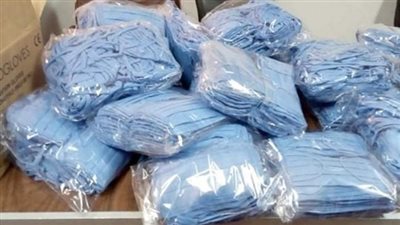 ضبط 3500 كمامة مجهولة المصدر داخل محل عطارة ببورفؤاد 