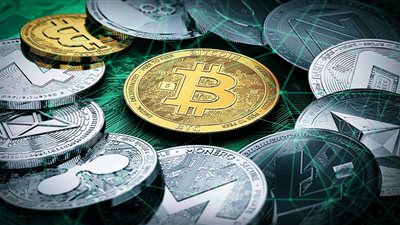 تباين أداء العملات الرقمية المشفرة.. بيتكوين تتراجع رغم التوقعات بالارتفاع