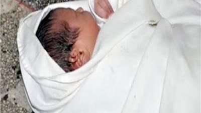 علاقة غير شرعية.. كواليس العثور على طفل أمام عقار بالدقي