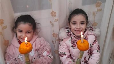 قصب وشموع.. مظاهر احتفالات أقباط الأقصر بعيد الغطاس