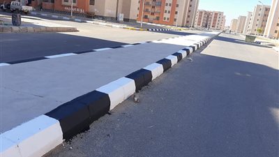 جهاز العاشر من رمضان يستكمل أعمال الطرق بمناطق الإسكان الاجتماعي | صور