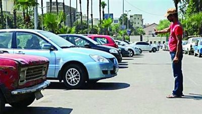 طرح مزايدة لحق استغلال أماكن الانتظار للمركبات في الشوارع بأحياء الدقي والطالبية