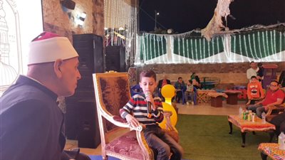 قبطي يسلم جوائز حفظة القرآن الكريم بنقابة العلميين بالدقهلية | صور