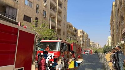 انتداب المعمل الجنائي لمعاينة حريق جراج في حدائق الأهرام| صور 