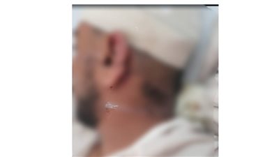 امشي علشان هبلغ الحكومة.. بلطجي يعتدي على طالب جامعي أمام محله بالجيزة