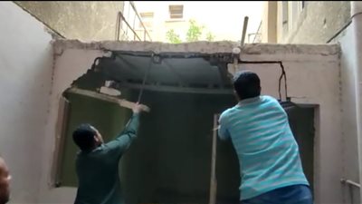 إزالة 14 حالة تحويل وحدات سكنية إلى محلات في الهرم والعجوزة ومخالفات بناء