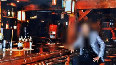 علاقات نسائية وخمور في بعثة رسمية.. ننشر صور طبيب شرعي مفصول زعم التحدث مع الجثث |فيديو