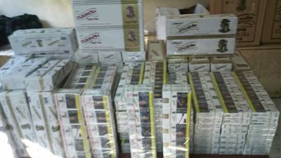 ضبط 12 ألف عبوة سجائر مهربة داخل مخزن بالسلام