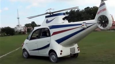 رجل يحول سيارته إلى طائرة هليكوبتر تسير في الطريق العام