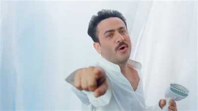 نسخة من مصطفى قمر.. حقيقة الصورة المنتشرة لـ تامر حسني على مواقع التواصل الاجتماعي