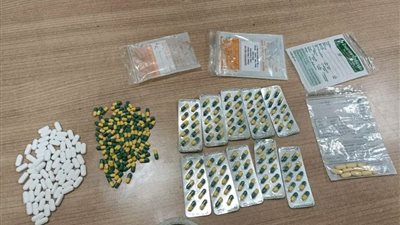 ضبط محاولة تهريب عدد من الأقراص المخدرة بمطار القاهرة