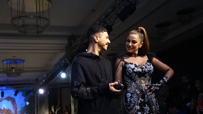  درة تتألق بسواريه جرئ في عرض أزياء مستفز للمحجبات والرجال بحضور نيللي كريم وبسمة وشريف مدكور (صور)