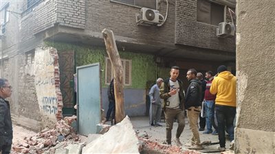 فتح شارع قمر الدولة بالجيزة بعد إزالة تعديات البناء على خط التنظيم